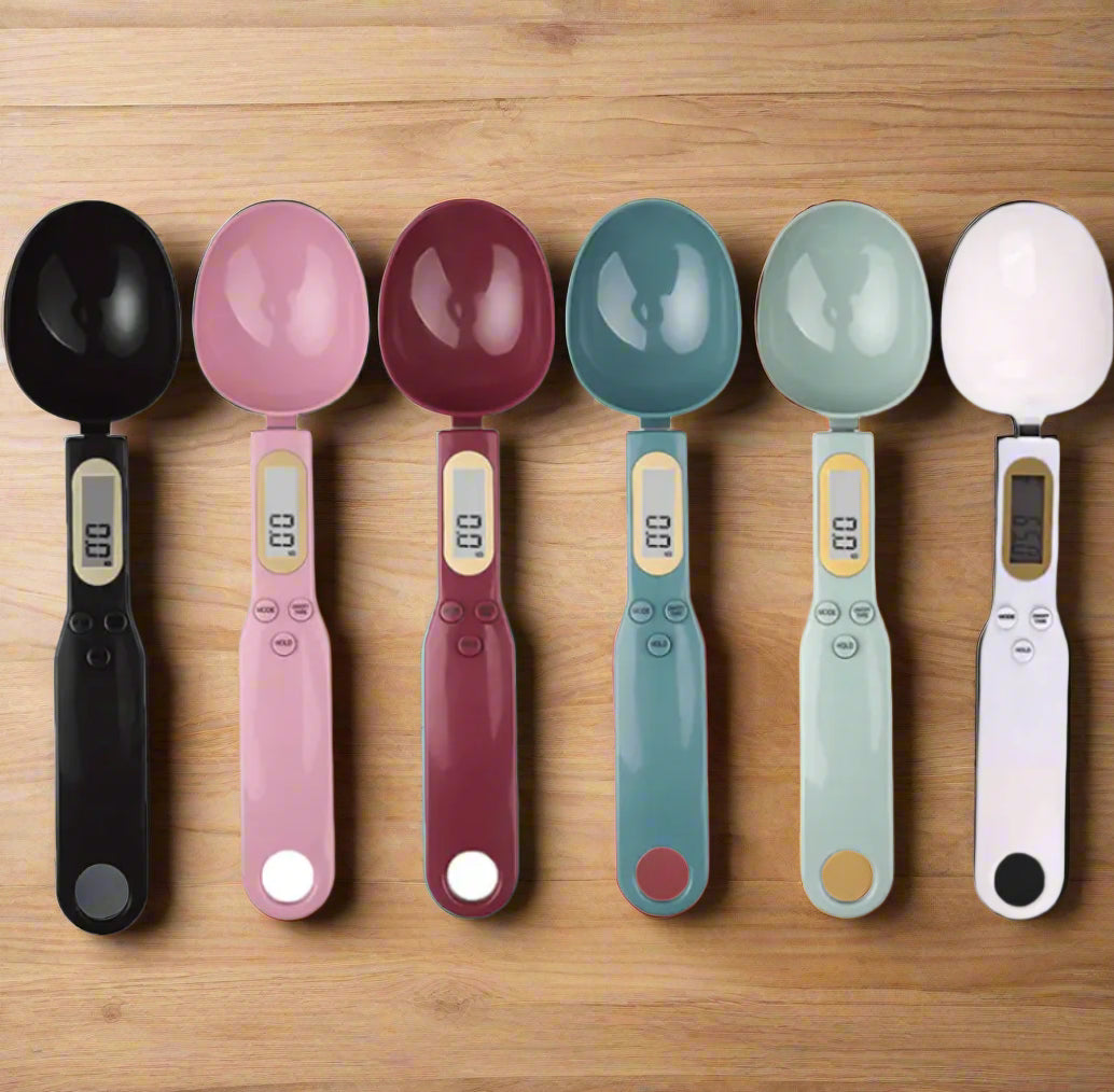 Set of six colorful digital measuring spoons on a white background