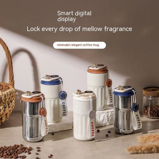 Set of minimalist coffee mugs with digital display and mellow fragrance on a neutral background.