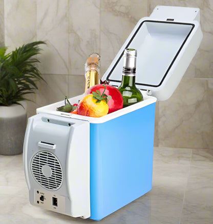 Portable mini fridge with food items on a light background
