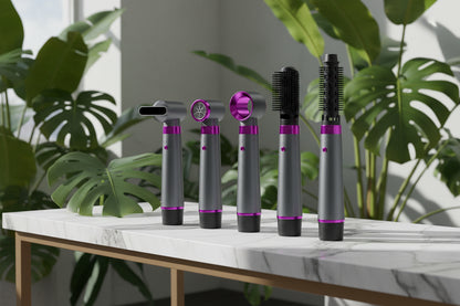 Set of hair styling tools with interchangeable nozzles on a white background