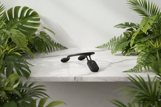 Black neck strap posture correction device with power symbol on a white background