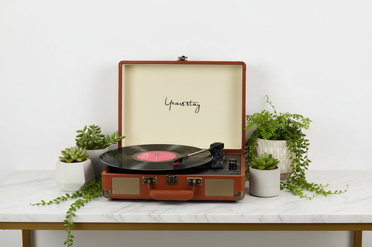 Brown vintage-style record player with 'Year&Stay' branding on a white background
