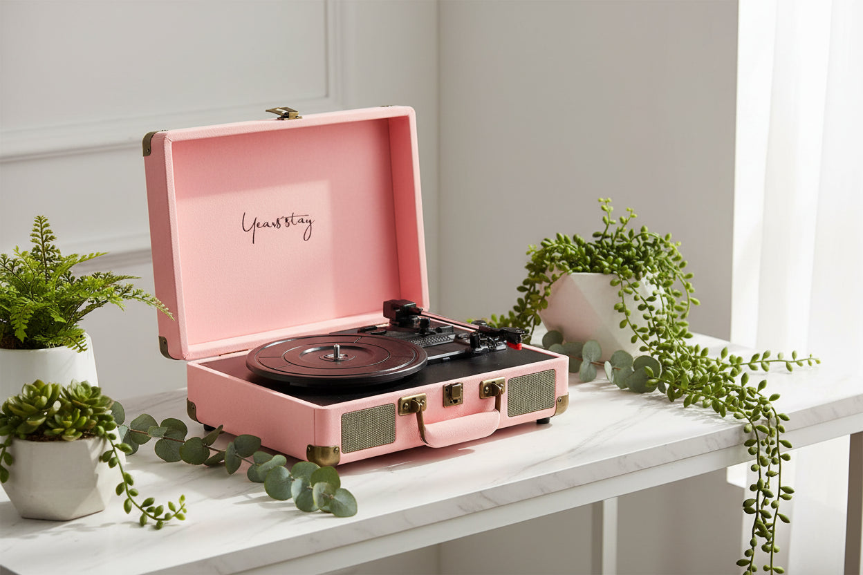 Pink vintage-style record player with 'Yeastay' branding on a white background