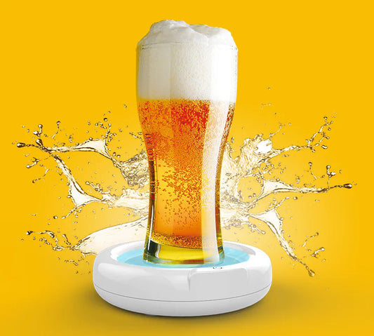 Glass of beer with foam on a yellow background