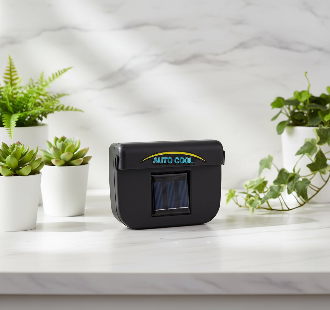 Black 'Auto Cool' device with solar panels on a white background