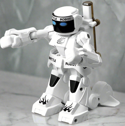 White robot toy with 'BATTLE ROBOT' text on a white background