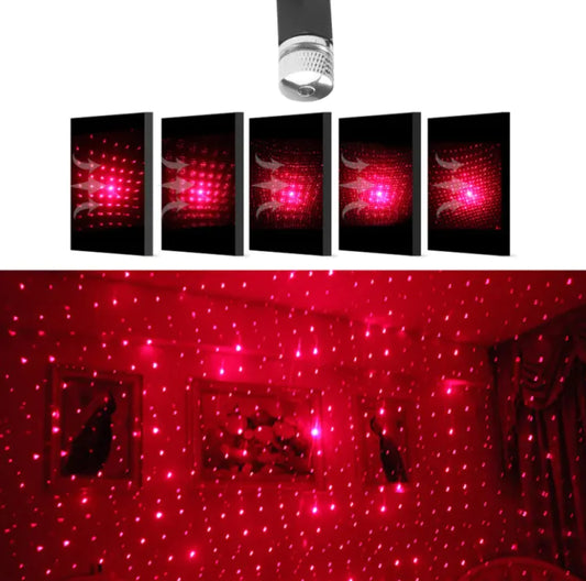 Red laser light projector with beams projected onto a ceiling