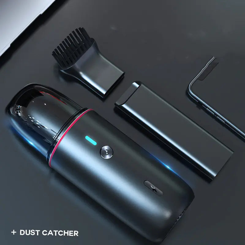 Black handheld vacuum cleaner with attachments on a dark background