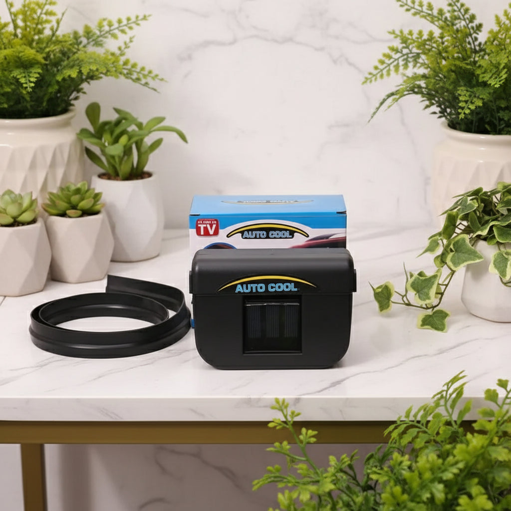 Black 'Auto Cool' device with packaging on a textured surface