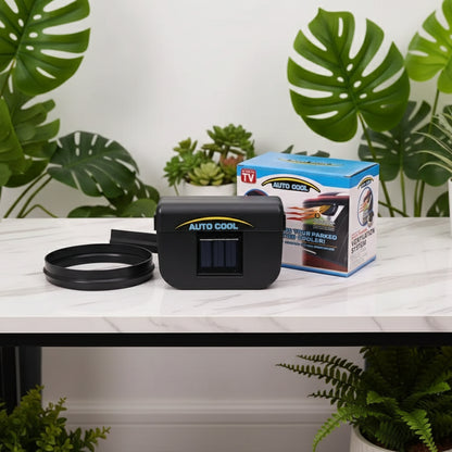 Black 'Auto Cool' device with packaging on a textured surface