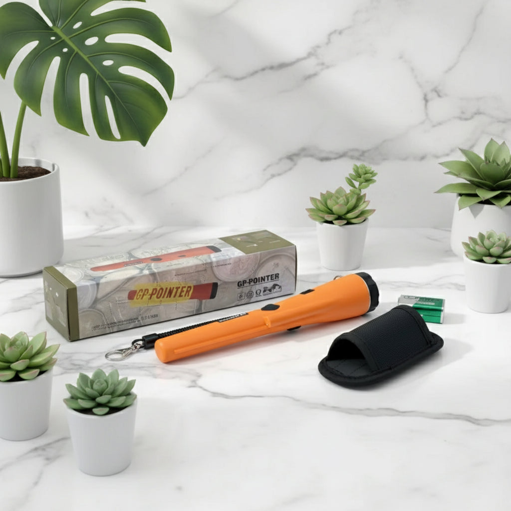 Orange metal detector with packaging, battery, and carrying case on a white background