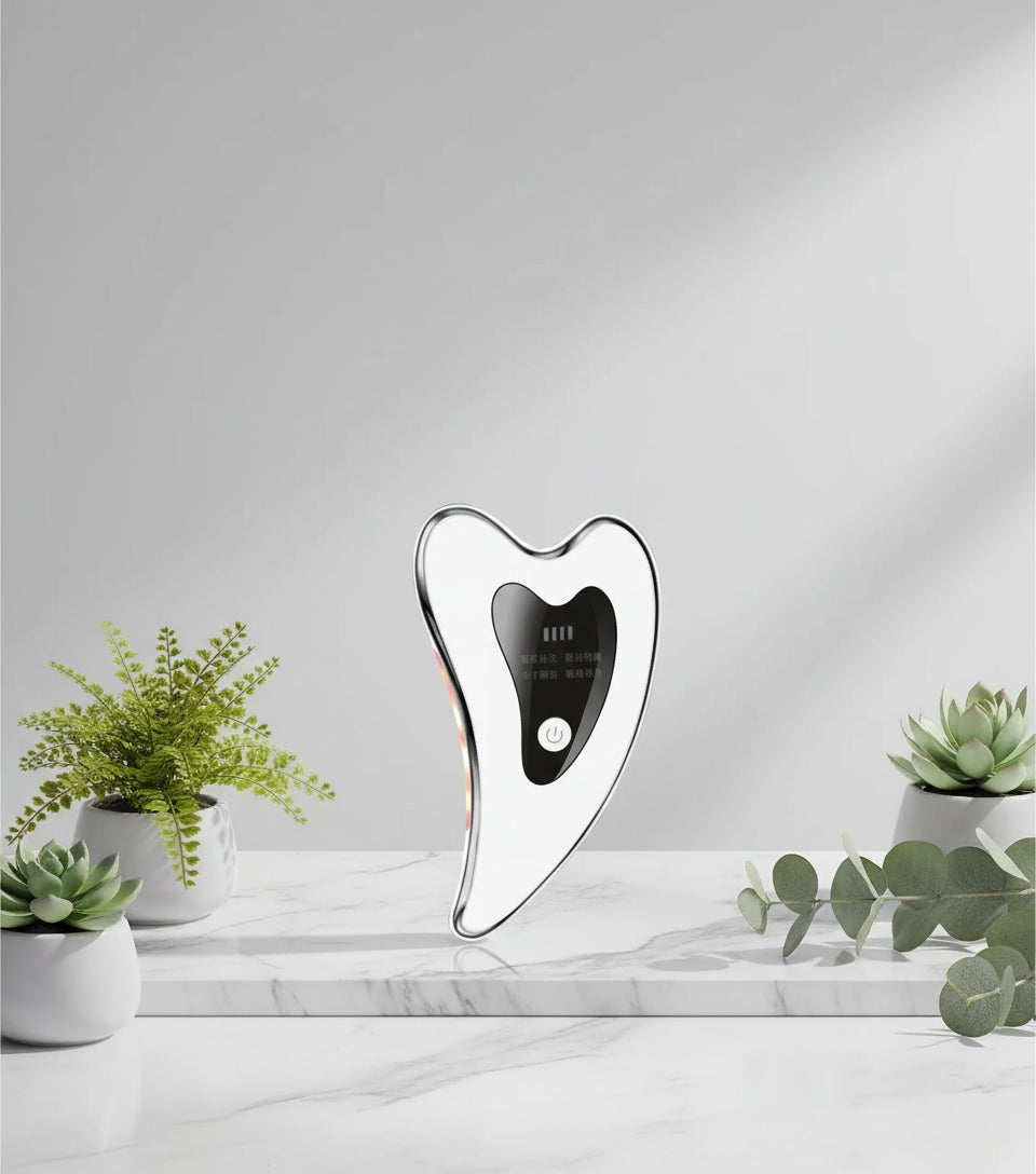 Heart-shaped electronic device with a black center on a white background