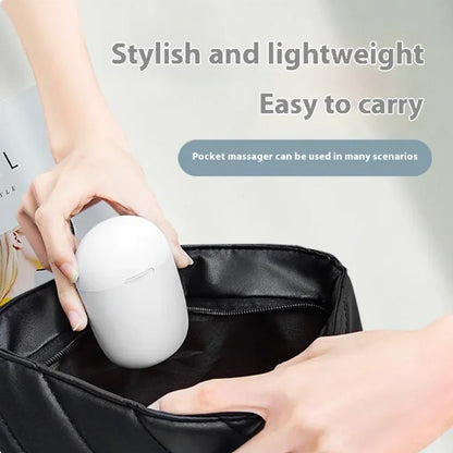 Hand placing a white pocket massager into a black bag with text highlighting its features.